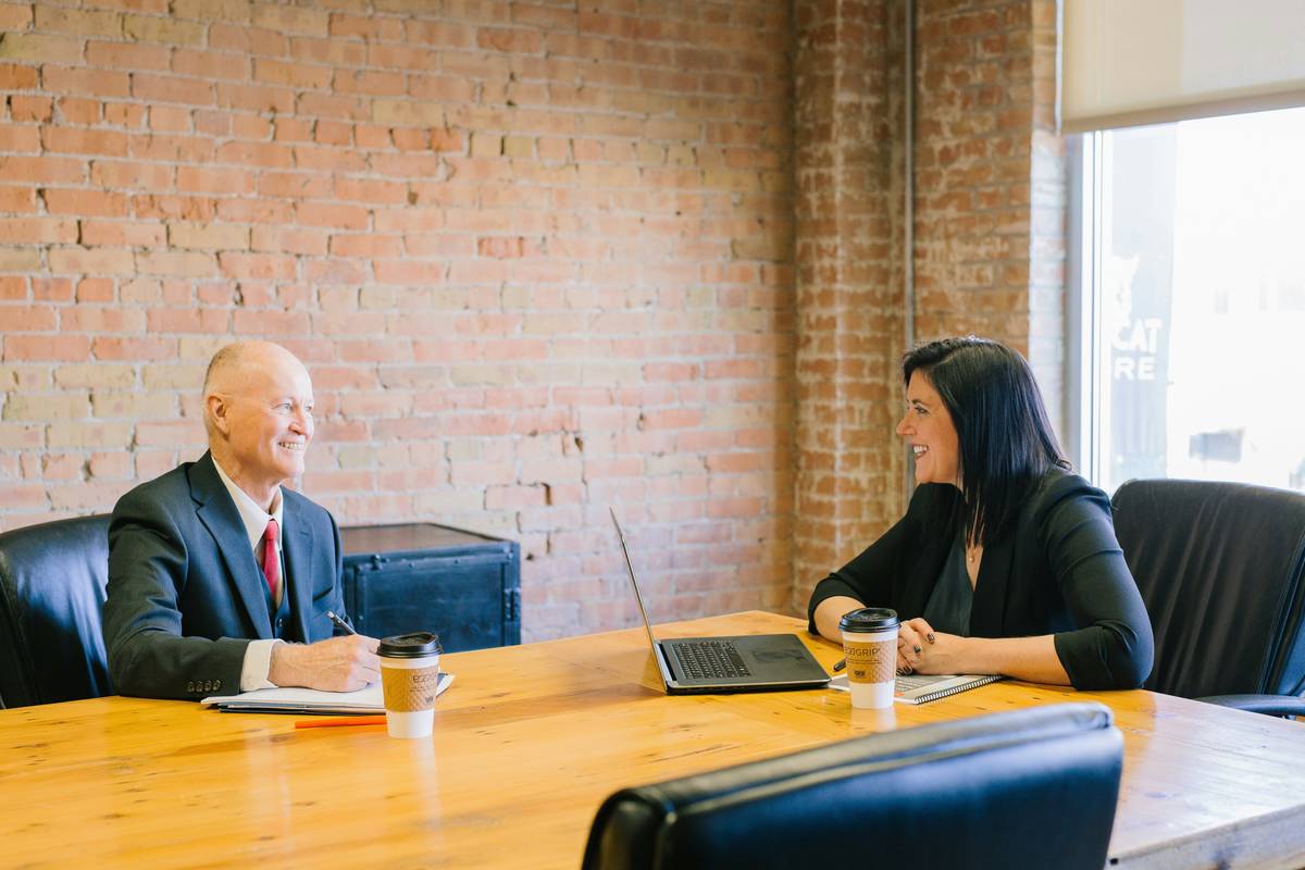 Sales professional using effective objection handling techniques during a client consultation about finance automation tools